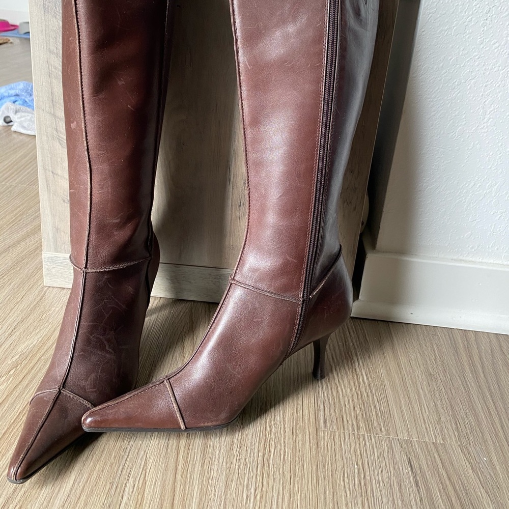 Pointed toe knee high boots